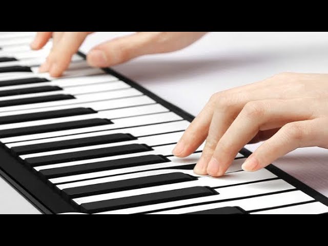Claviers Piano Souple 61 Touches en Silicone Pliable, Un son de piano bien  reproduit pour ce clavier 