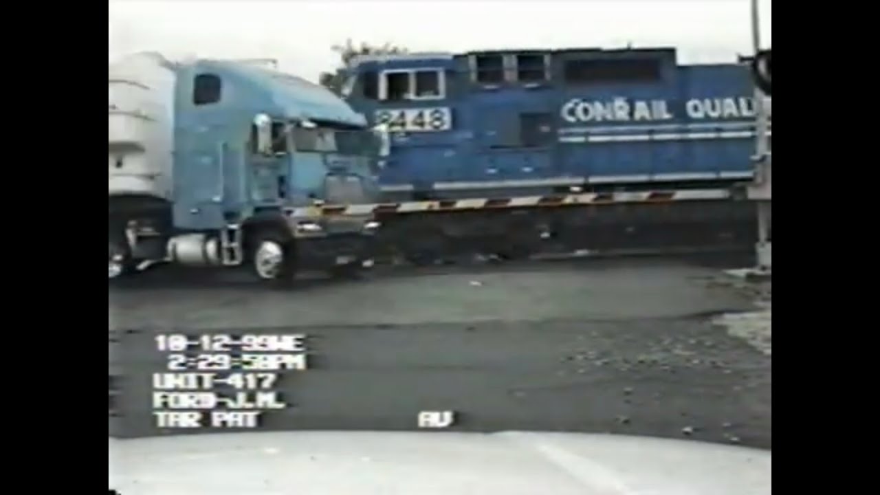 Train Hits Stalled Semi Truck At Railroad Crossing