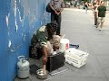 drums' beat homeless music 5th Avenue New York