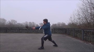 Using different parts of a tabar (axe) to strike and thrust