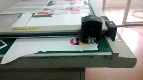 Video of DCH30 sample cutting machine cutting cardboard, stickers and PVC at customer factory.