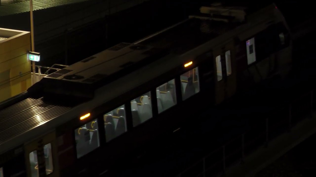 Airtrain arriving at the Airport (Domestic) Station, Brisbane, Queensland, Australia