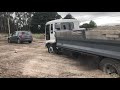 Mahindra XUV500 pulls out a big truck STUCK in a hole: Power of all wheel drive? [Video]