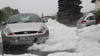 Hailstones pile up as heavy storms hit Germany