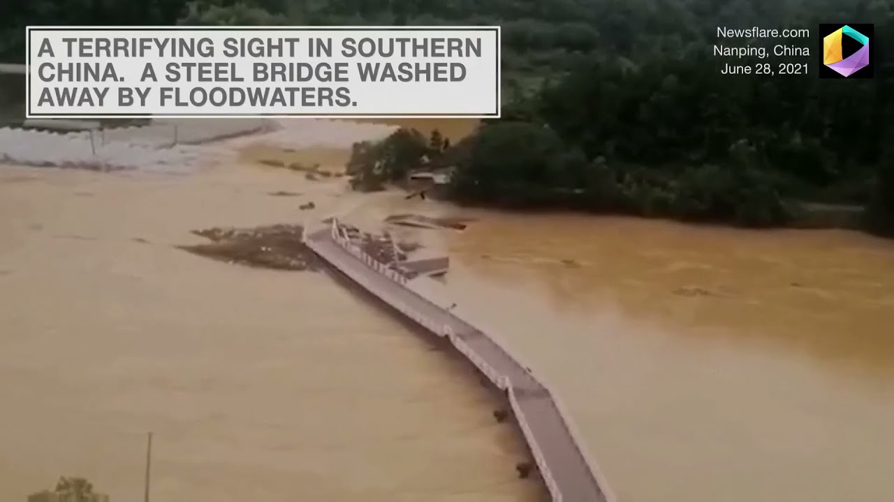 Bridge Swept Away by Floodwaters In Southern China
