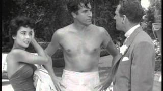 ELIZABETH TAYLOR AND FERNANDO LAMAS GO SWIMMINGLY