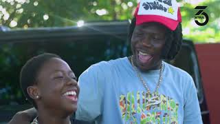 Stonebwoy surprises young fan Charis Louisa with a smart phone and branded souvenirs