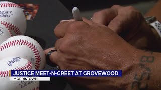 Justice greets fans at Grovewood Baseball Museum Inside Grovewood Baseball Museum