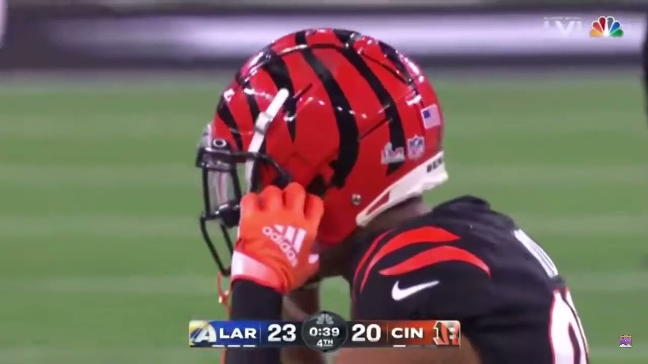 Aaron Donald points at the RING finger