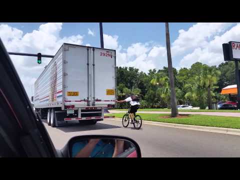 Guy gets pulled by semi truck 50 MPH !!