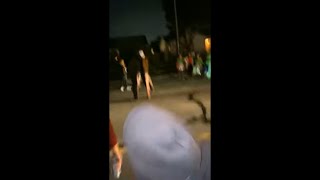 Crowd Filming and Taking Pictures of a Halloween Costume They Cam Across While Trick or Treating