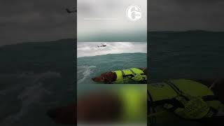 Man and dog rescued from stormy seas during Hurricane Helene