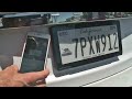 Electronic license plates let drivers customize display by phone