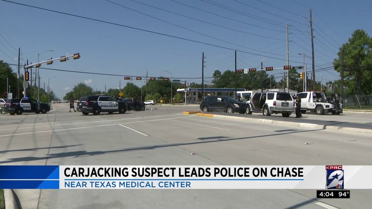 Carjacking suspect leads police on chase - YouTube