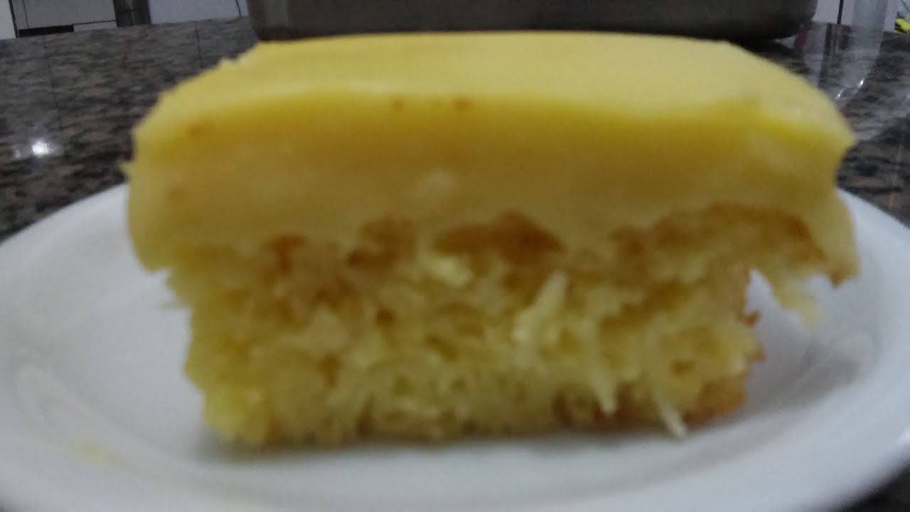 BOLO DE MILHO COM COBERTURA DE CURAU (CANJICA)