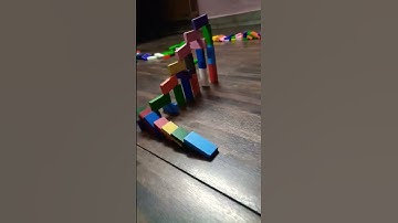 a new type of a stair climbing Domino trick fail in slow motion #trending domino