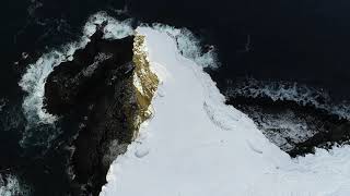 Drone view of the breathtaking cliffs in Eggjarnar (Faroe Islands)