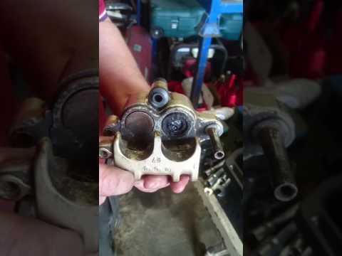 How to free Seized motorcycle brake pistons