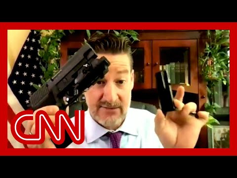 Lawmaker pulls out weapons on webcam: 'I can do whatever I want with my guns'