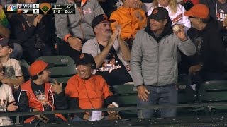 Fan makes a nice grab on a foul ball