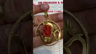 A pendant where matter meets mantra. Coral, sapphire & gold converge✨ 🕉️