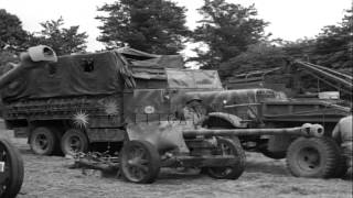 American troops march forward in France during World War 2 HD Stock Footage