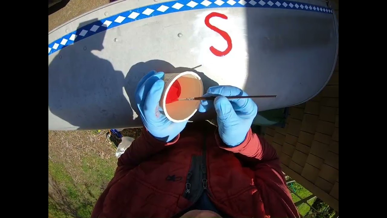Painting the Name on a 1976 Michicraft Aluminum Canoe
