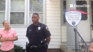 Officers talk about the new resident police officer at 220 W Republic in Peoria