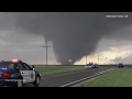 Cars stop to let large tornado pass by, Kansas