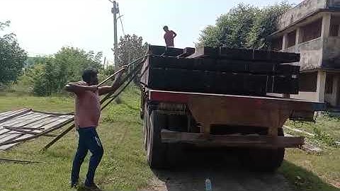 UNLOADING OF 8 METER PSC POLE AT THE SITE .