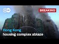 Massive fire engulfs residential building in Hong Kong |  DW News