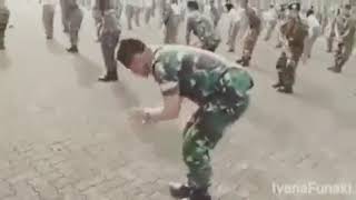 Asian soldier dancing to Afro-Beat