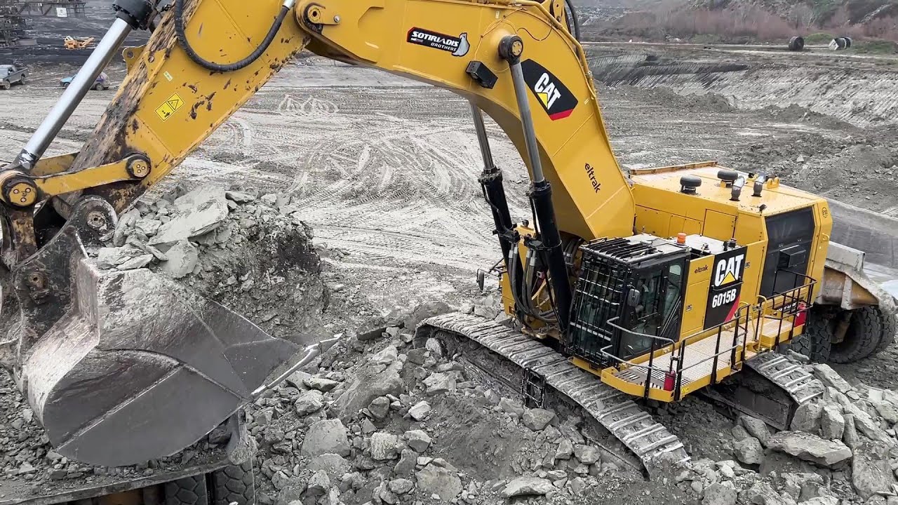 Caterpillar 6015B Excavator Loading Caterpillar Dumpers And Trucks - Sotiriadis Mining Works