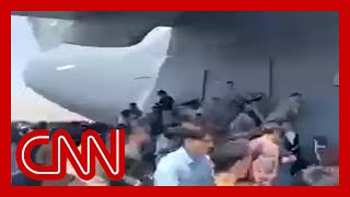 Chaos at the airport as Afghans try to flee the Taliban