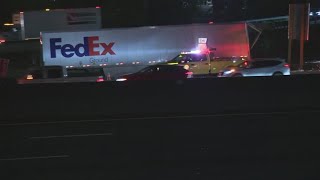 Lanes blocked after FedEx truck crashes into bridge beam