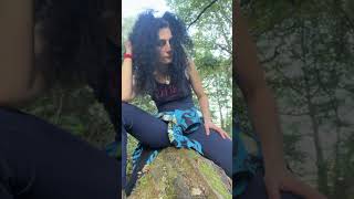 Barefoot grounding woodland tree trunk, moss and mushrooms 