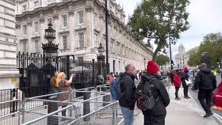 Stop Cambo: Greenpeace Activists outside Downing Street London being removed by police 11 Oct 2021