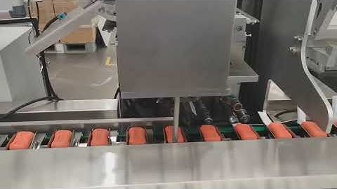 Automatic cartoning machine with automatic feeder