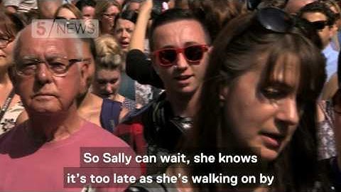 Crowds in Manchester sing 