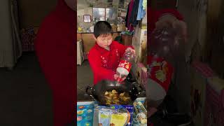 little boy Li Giang steam chicken with coca for Grandparent