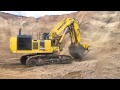 Экскаватор Komatsu PC1250-7 играет мышцами!