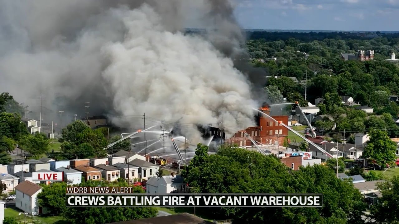 Multiple crews fighting fire at vacant warehouse in Louisville's