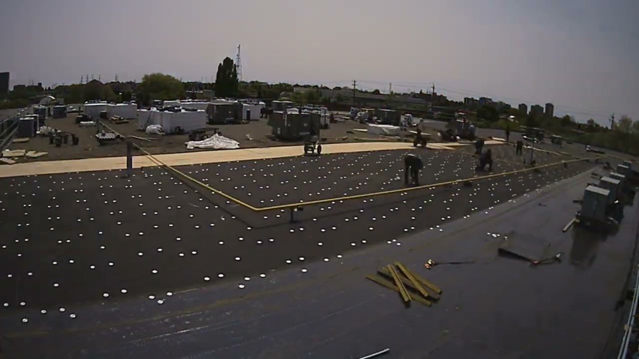 Still from NorthCan Roofing's own film: Mastering Quality Flat Roof Repair in Scarborough at 77 Nantucket Blvd