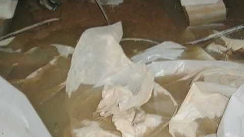 Inferior 6 mil plastic crawl space vapor barrier.