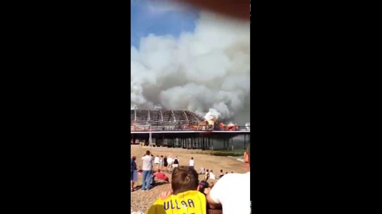Eastbourne pier. Fire destroys a third of Victorian pier.Live footage from the beach