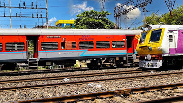 Beautiful aerodynamic EMU local train made a delightful crossing with express train