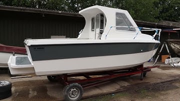 SF Marine, UK Hurricane 21 XL cabin with custom outboard pod, export
