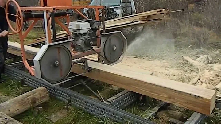 Jeremy Gamache milling white oak logs for a wood s...