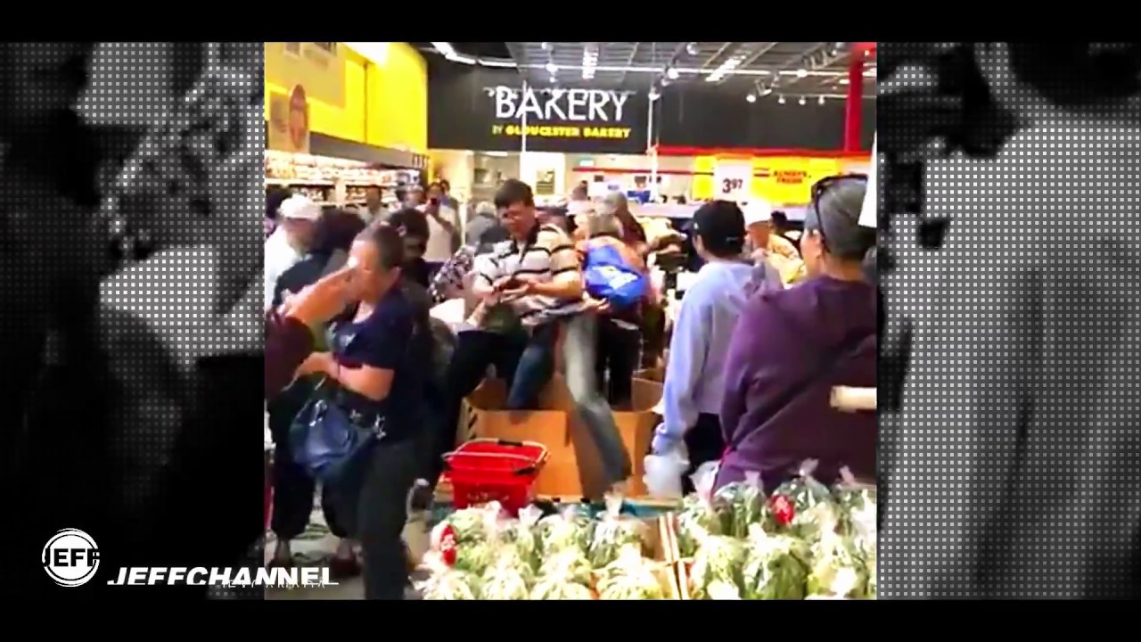 People push each other over corn -- No Frills Scarborough, Ontario, Canada -- JEFF CHAN REACTS