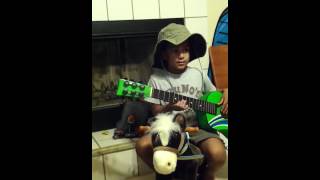 guitar playing 3 year old